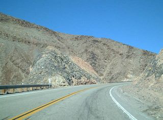 California 190 climbs Towne Pass (el. 4,956 feet), which separates Panamint Valley from Death Valley. The state route will descend from here to the lowest elevation in the United States.