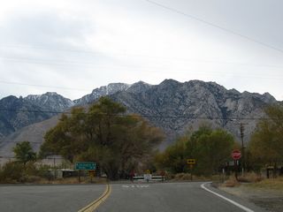 Westbound California 190 concludes at U.S. 395 in the unincorporated community of Olancha. On the other side of the Sierra Nevada, California 190 has a short segment in the Central Valley that is not directly connected to this section. Plans originally called for connecting the two state routes, but the highway was not built over the towering mountains.