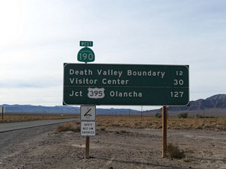 This mileage sign and first reassurance shield are posted along California 190 west after the California 127 intersection.