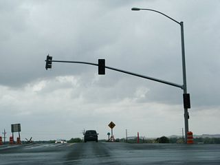 This traffic signal, which was newly installed upon the relocation of California 70 due to the Wicks Corner Interchange project, is found at the north end of Table Mountain Boulevard (Old California 70) at the point where it meets California 70. Table Mountain Boulevard north transitions directly onto California 191 north.
