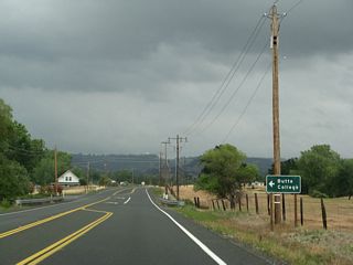 Shortly thereafter, northbound California 191 (Clark Road) approaches the turnoff to Butte College Drive west to Butte College. Butte College Drive loops from California 191 west and then south to meet Durham-Pentz Road.