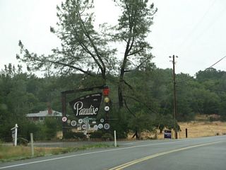 A second sign advises that "You Are Ascending into ... Paradise."