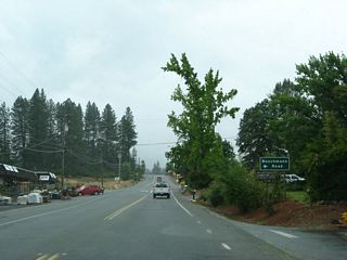 Northbound California 191 (Clark Road) approaches Buschmann Road.