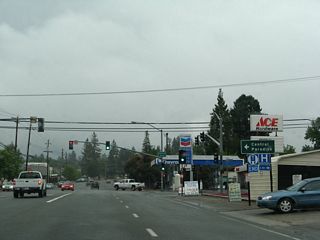The state route ends at the intersection with Pearson Road as shown at this signalized intersection. The only indication that California 191 ends here is the blue "truck route end" sign; there is no end shield. Turn left on Pearson Road into central Paradise and to Skyway Road west to California 99 (Exit 383) and Chico.