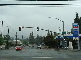 Northbound California 191 ends at Pearson Road at this traffic signal. Clark Road continues north, merging into Skyway Road en route to Magalia, Paradise Pines, DeSabla, Lovelock, and Stirling City.