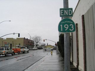 The end shield for SR 193 in Downtown Lincoln was removed by 2012 and the entire overhead assembly for SR 65 was by 2015.