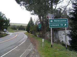 SR 193 (Newcastle Highway) proceeds west from Taylor Road to intersect Main Street south to the New Castle business district.