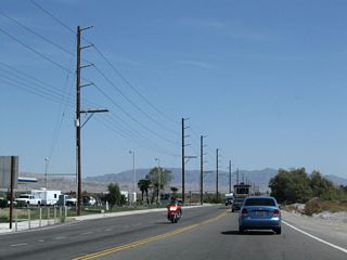 California 195 connects the California 86 expressway with California 111 and Interstate 10 near Mecca along the northern shore of the Salton Sea. This link is needed because there is no direct interchange between California 111 and the California 86 expressway. The route was previously much longer (with extensions west to former California 86 (Harrison Street) and east to Interstate 10; it was decommissioned in stages). Plans call for the eventual elimination of this route with the completion of the California 86-S expressway.