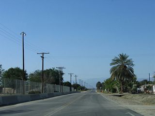 Pierce Street (former California 195) proceeds through some agricultural areas with some interspersed residential areas.