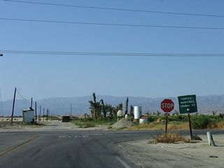 Northbound Pierce Street meets 66th Avenue. Turn left here for 66th Avenue west to former California 86 (Harrison Street) or right for 66th Avenue east to California 86 expressway and California 111 near Mecca. California 195 used to turn right here onto 66th Avenue.
