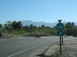 A begin California 195 shield is posted on westbound 66th Avenue after the California 111 intersection near Mecca. Plans call for California 195 to be redesignated as California 111, but that has not yet happened as of February 2013.