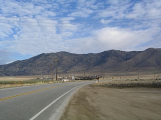 State Route 202 commences east along W Valley Boulevard from the correctional facility entrance and ahed of Bear Valley Road.