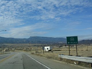 SR 202 west overlaps with SR 58 Business east from a parclo interchange along the SR 58 freeway bypassing Tehachapi.