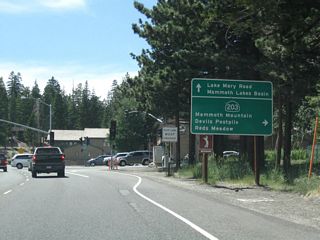 A second sign advises of the destinations served by California 203 and Lake Mary Road.