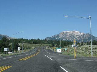 The first three miles of SR 203 leading west from U.S. 395 constitute an expressway.
