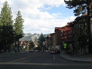 A series of condominiums line the sides of California 203 through downtown Mammoth Lakes. Mammoth Lakes sits at an elevation of 7,880 feet and had a population of 7,093 people as of the 2000 Census. The town incorporated on August 20, 1984. Mammoth Lakes is known as a gateway community for Mammoth Ski Resort and various recreational opportunities around Mammoth Lakes. U.S. 395 avoids Mammoth Lakes by staying to the east of the town; California 203 is the primary route through town.