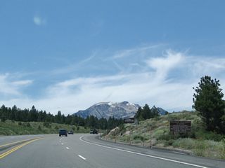 Beyond Mammoth Mountain and Minaret Summit (Mono-Madera County Line), traffic is restricted from using California 203 between the hours of 7:00 a.m. and 7:00 p.m. each day during summer months. Visitors wishing to see Devils Postpile National Monument, Rainbow Falls, and Reds Meadow must use the shuttle bus, which is available at the Mammoth Mountain resort parking lot. The shuttle bus requirement was implemented to remove excessive traffic between Agnew Meadows and Reds Meadow. The state route ends at Minaret Summit.