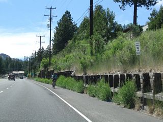 Coming into downtown, a postmile marker indicates a mileage of 5.00 (realigned).