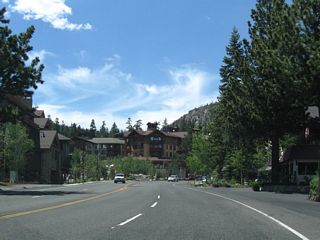 After the Minaret Road traffic signal, California 203 curves north briefly to pass by a series of large condominium resort complexes.