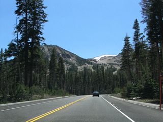 The slopes of Mammoth Mountain come into view. Skiers travel from all over the Southwest to ski at Mammoth Mountain. A common refrain each winter is the journey of skiers from Southern California up U.S. 395 to Mammoth for a weekend of skiing.