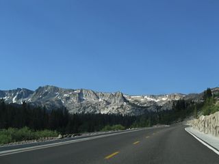 Lake Mary Road curves southwest and then south toward the towering peaks that line up behind Mammoth Lakes, including Mammoth Peak (el. 11,030 feet).