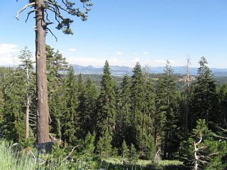 Looking south and east from the top parking lot at the Bear Valley Mountain Resort is this view of Bear Valley looking toward Elephant Rock and Bull Run Peak in the distance.