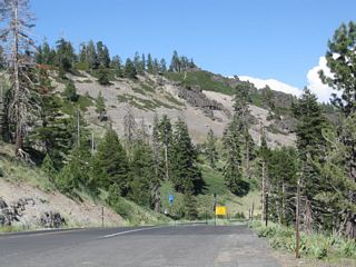 Leaving the Bear Valley Mountain Resort parking lot, California 207 begins its journey east and then south to meet California 4 a few miles east of Bear Valley Village.
