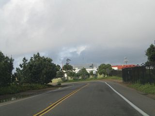 Passing through the military installation is a cemetery on the east side of Cabrillo Memorial Drive.