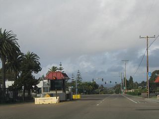 Leaving Fort Rosecrans Military Reservation, California 209 shifted from Cabrillo Memorial Drive to Catalina Drive at this point. A guard house is located at the point where the state route left the military area with restricted hours of access and becomes a city street from here northward.