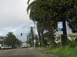 Northbound Catalina Boulevard meets Lomaland Drive and Wilcox Street at this traffic signal.