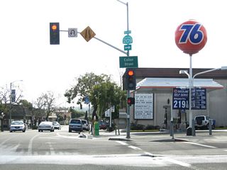 Southbound Rosecrans Street in the Roseville neighborhood of San Diego where SR 209 turned northwest onto Canon Street.