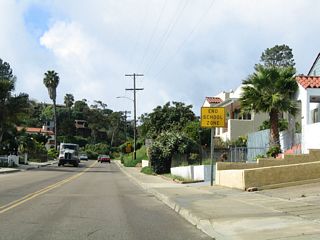 Leaving Roseville, westbound Canon Street passes by several Spanish revival homes before entering a small canyon.