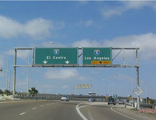 State Route 209 ended with ramps joining Interstate 8 east toward El Cajon and I-5 north to Carlsbad and Oceanside.