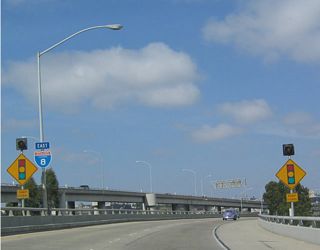 The entrance ramp from Camino del Rio W north joins Interstate 8 east across from the flyover from I-5 south.