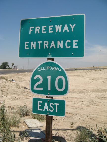 State Route 210 freeway entrance sign in San Bernardino, CA