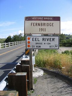 California 211 spans the Eel River northeast across the historic Fernbridge.