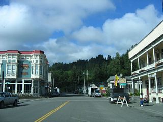 SR 211 west concludes at the end of Main Street and the intersection with Ocean Avenue and Francis Street.