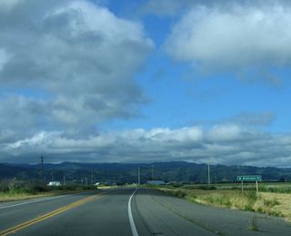 Southbound California 211 approaches Waddington Road, which travels south to Grizzly Bluff Road.