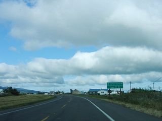 Heading southwest after the Old River crossings, California 211 next intersects Coffee Creek Road south and Sage Road north.