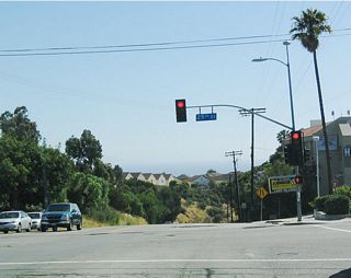 The southern terminus of California 213 is located at the intersection of Western Avenue and 25th Street. Twenty-fifth Street becomes Palos Verdes Drive South to the west, once 25th Street leaves San Pedro and enters Rancho Palos Verdes. Eastbound 25th Street connects with Gaffey Street southwest of the Los Angeles Harbor.