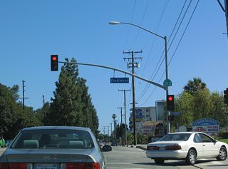Upon reaching Crestwood Street, California 213 (Western Avenue) prepares to ascend the eastern slope of the Palos Verdes Hills.