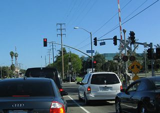 The traffic signal for east-west Torrance Boulevard is a few blocks south of Del Amo Boulevard. Torrance Boulevard eastbound passes through the Harbor Gateway community of Los Angeles, then meets Interstate 110 in Long Beach. To the west, Torrance Boulevard enters the city of Torrance, passing by the Civic Center between Maple Avenue and Madrona Avenue.