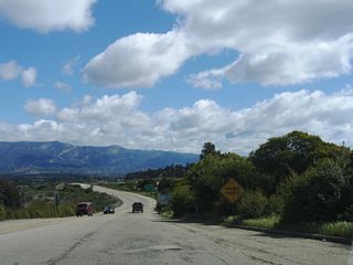 Two lanes carry California 217 for the first half mile of the nascent freeway.