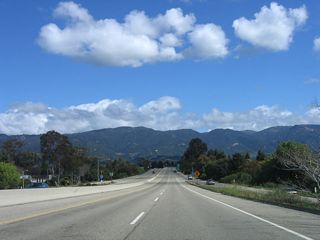The towering Santa Ynez Mountains dominate the view from California 217 as the short freeway nears its northeastern terminus at U.S. 101 near Patterson Avenue.