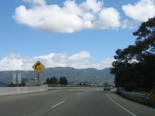 The freeway banks east as it crosses the Union Pacific Railroad prior to the U.S. 101 freeway merge.