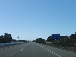 Clarence Ward Memorial Boulevard ends at the entrance to the university, so motorists may turn their radio to 1610 AM for parking and visitor information.