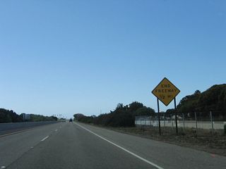 The freeway ends in one-half mile, after the Sandspit Road interchange.