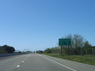 The right lane of westbound California 217 (Clarence Ward Memorial Boulevard) becomes exit only for Exit 1, Sandspit Road to Santa Barbara Municipal Airport and Goleta Beach County Park. The left lane continues west to UCSB.