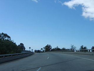 Two lanes carry California 217 westbound traffic over U.S. 101.