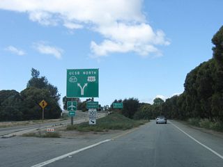 A diagrammatical split sign posts the left lane to California 217 and the right lane to U.S. 101 from Patterson Avenue. A freeway entrance shield assembly is posted for U.S. 101 north but oddly not for California 217 west.